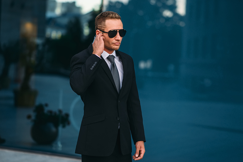 Executive protection detail with secure vehicle